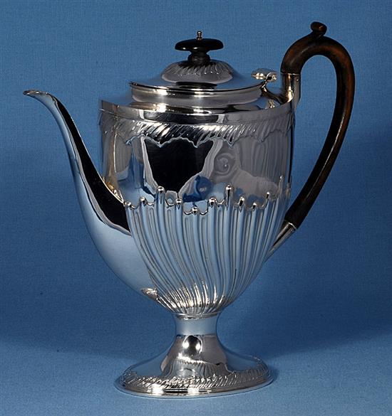 A Victorian demi fluted silver pedestal coffee pot,